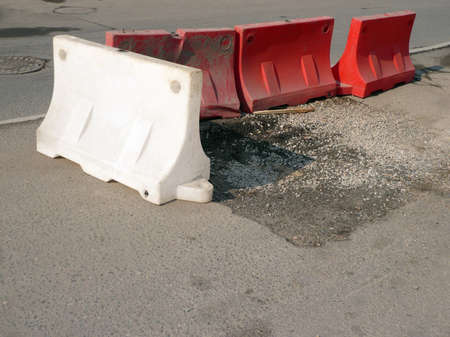 restrictive blocks on road repair at dry sunny day
