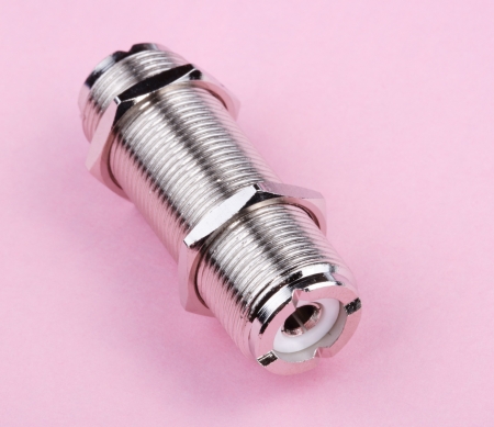 Radio Connector on Pink Background