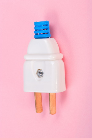 American Outlet Plug on pink background