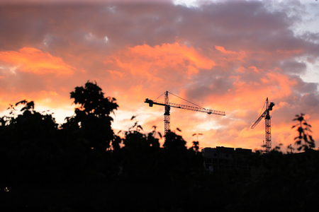Crane Tower on Sunset Sky Backgroundの写真素材
