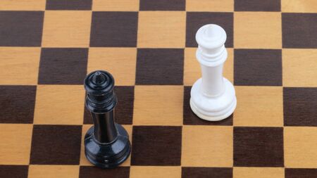 wooden checkerboard with figures