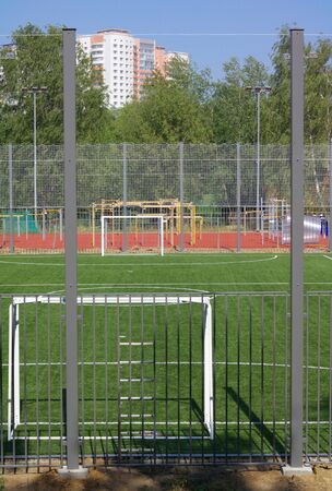 football field near fence at day sunny dayの写真素材
