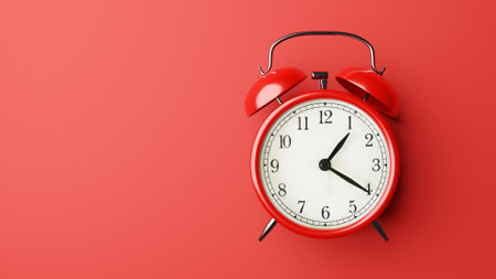 Red vintage alarm clock on red color background,3D renderの写真素材