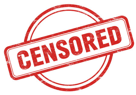 CENSORED text on red grungy round vintage rubber stamp.の素材