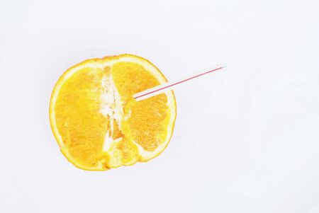 A straw in orangeの写真素材