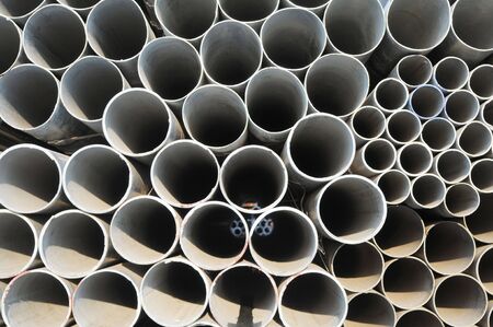 Close up on a stack of industrial pipesの写真素材