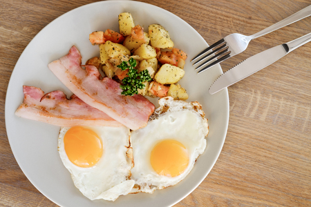 ?late with bacon potatoes and eggsの写真素材