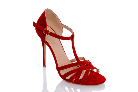 a beautiful suede shoes in red on heelの写真素材