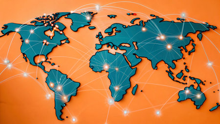World map with glowing lines on orange background. Concept of global communication.