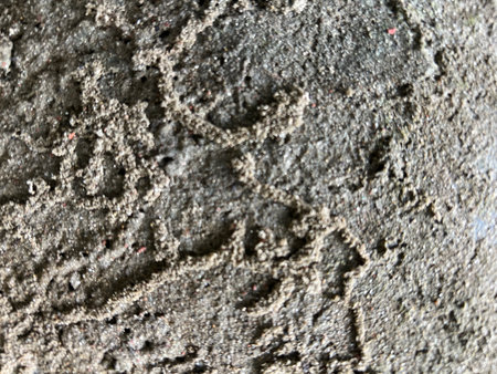 Close up of the textured surface of a concrete slab. Abstract background.
