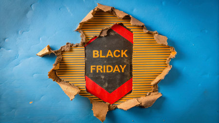 Black Friday sale label on blue background with space for your text.の写真素材