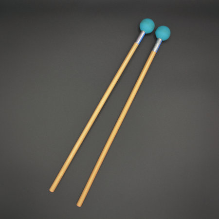 Xylophonemallets on a black background.