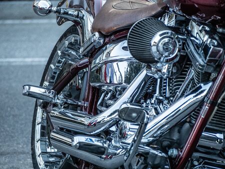 A bikeÂ´s side showing its design and metalsの写真素材