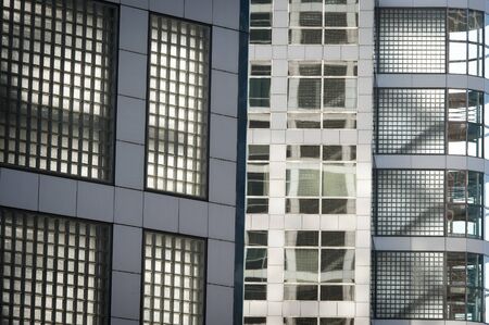 Glass windows in wall of office buildings exteriorの写真素材