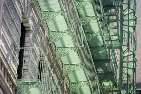 Fire escape emergency stairs on side of buildingの写真素材