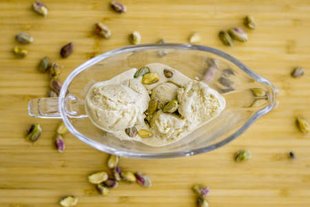pistachio icecream scoop wood table
