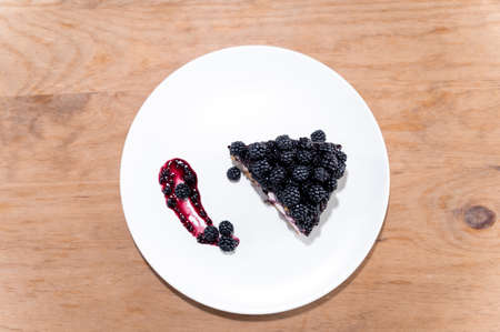 blackberry tart slice dessert wood white