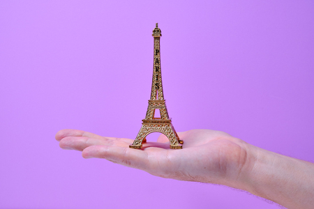 Eiffel tower hold in hand close upの写真素材
