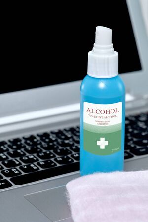 Alcohol pad for clean laptop computer phone and technology to prevent corona virus covid-19の写真素材