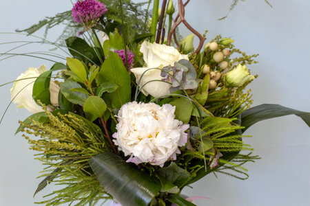 Bouquet of white and pink flowers on the white background.の写真素材