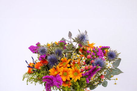 colorful flower bouquet isolated on white background, closeup of photoの写真素材