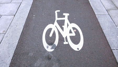 Bicycle painted on tarmac of bicycle lane