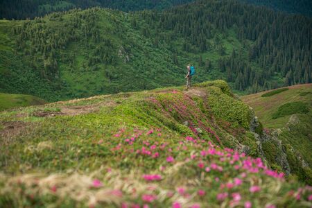 Woman on top of mountainの写真素材