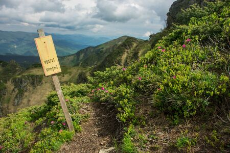 Breakdown warning sign in the top of the mountainの写真素材