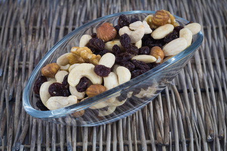 Different nuts in a glass cupの写真素材