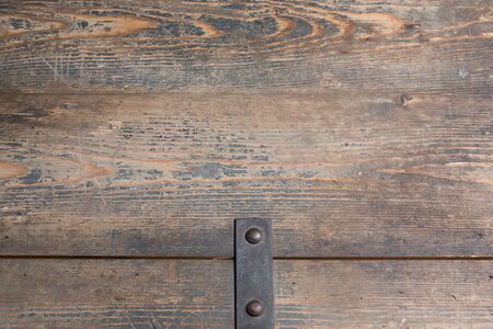 The top of an old chest as a wooden backgroundの写真素材