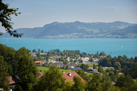 Lake Attersee and sky and meadows in summerの写真素材
