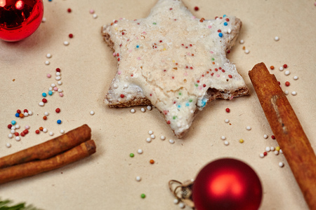 Christmas cookies and balls and fir branch closeupの写真素材