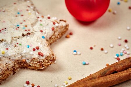 Christmas cookies and balls and fir branch closeupの写真素材