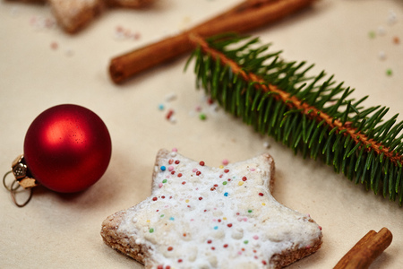 Christmas cookies and balls and fir branch closeupの写真素材