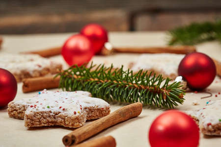 Christmas cookies and balls and fir branch closeupの写真素材