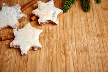 Christmas cinnamon stars on a wooden tableの写真素材