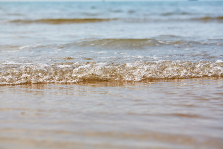 Little ripples in the sand from the sea on the beachの写真素材