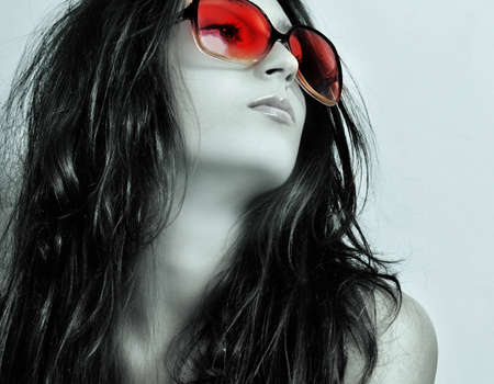 The girl in sun glasses の写真素材