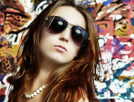 The girl in  glasses and a beadsの写真素材