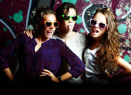 fashionable girls in sunglassesの写真素材