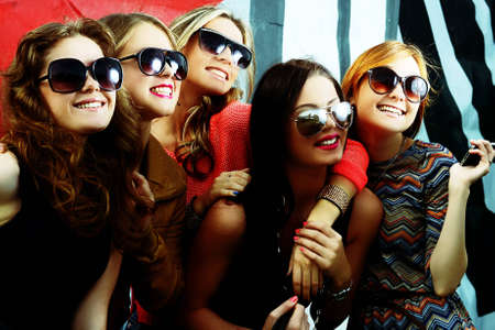 fashionable girls in sunglassesの写真素材