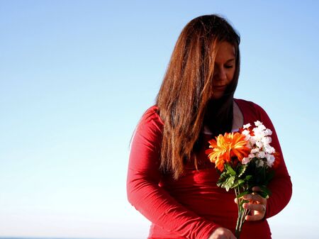 Girl with flowersの写真素材