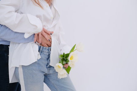 Lovely couple hugging and holding each others handの写真素材