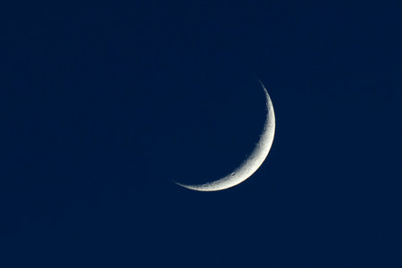 The waxing moon is the phase when the crescent of the moon becomes visible again after the new moon.の写真素材