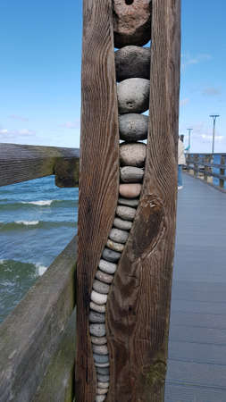 Pebbles placed in a wooden trunk as a work of art.