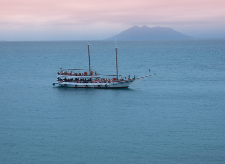 BUZIOS, BRAZIL - October 14, 2016: Passenger ship is seen sailing next to azeda beach in Buzios, Brazil.のeditorial素材