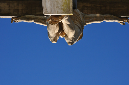 View of the a Jesus Statue in the Calvario of Tandil City in Buenos Aires, Argentina against blue skyの写真素材
