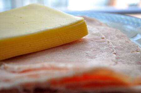 Cheese in sheets and smoked hamの写真素材
