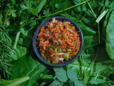 Salad with aromatic herbs backgroundの写真素材