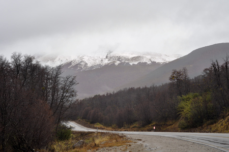 Route with Snowcaped andes mountains background in Neuquen, Patagonia, Argentinaの写真素材